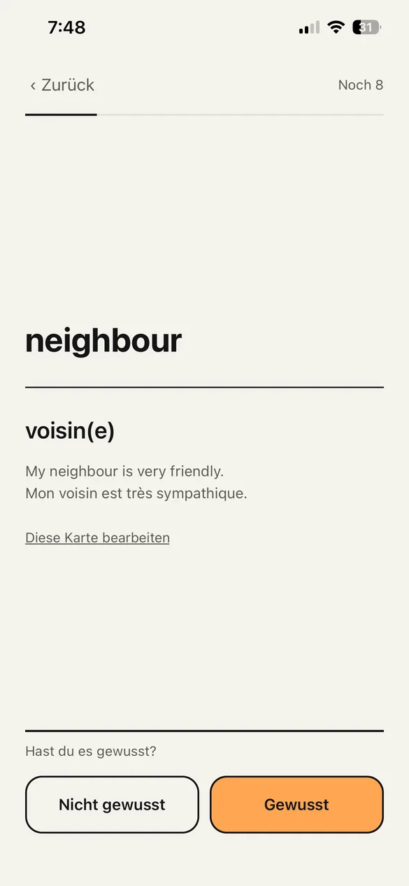 Der Wiederholungsbildschirm. Vorne ein englisches Wort, hinten Bedeutung und Beispiel, dazu zwei Tasten.